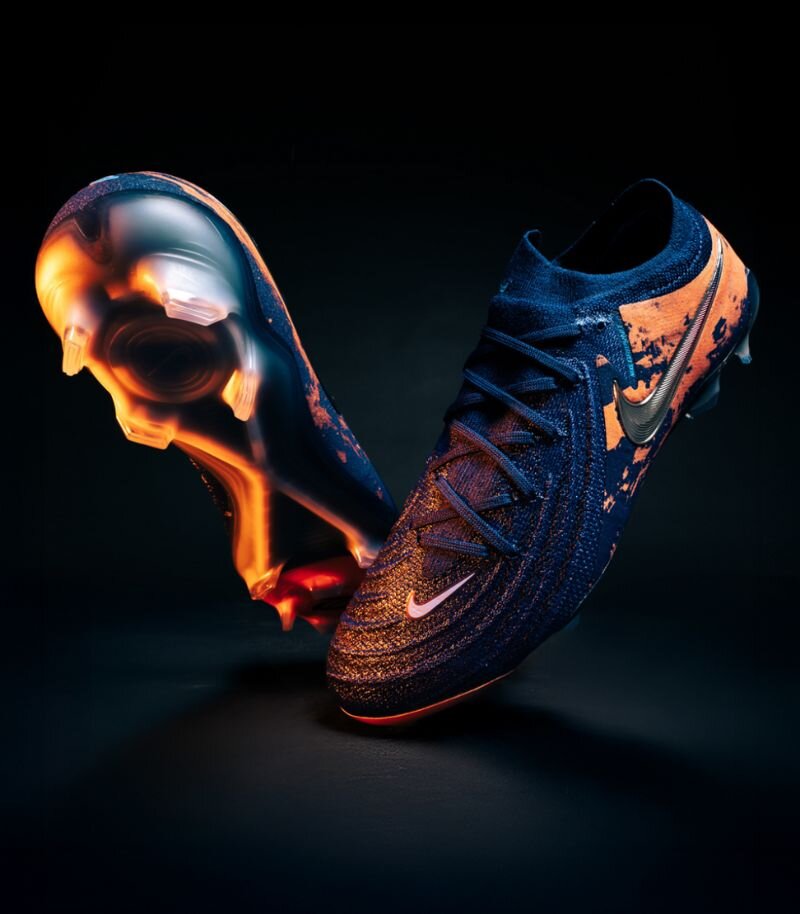 nike phantom gx 2 football boots in Haaland edition, which is navy blue with orange graphics